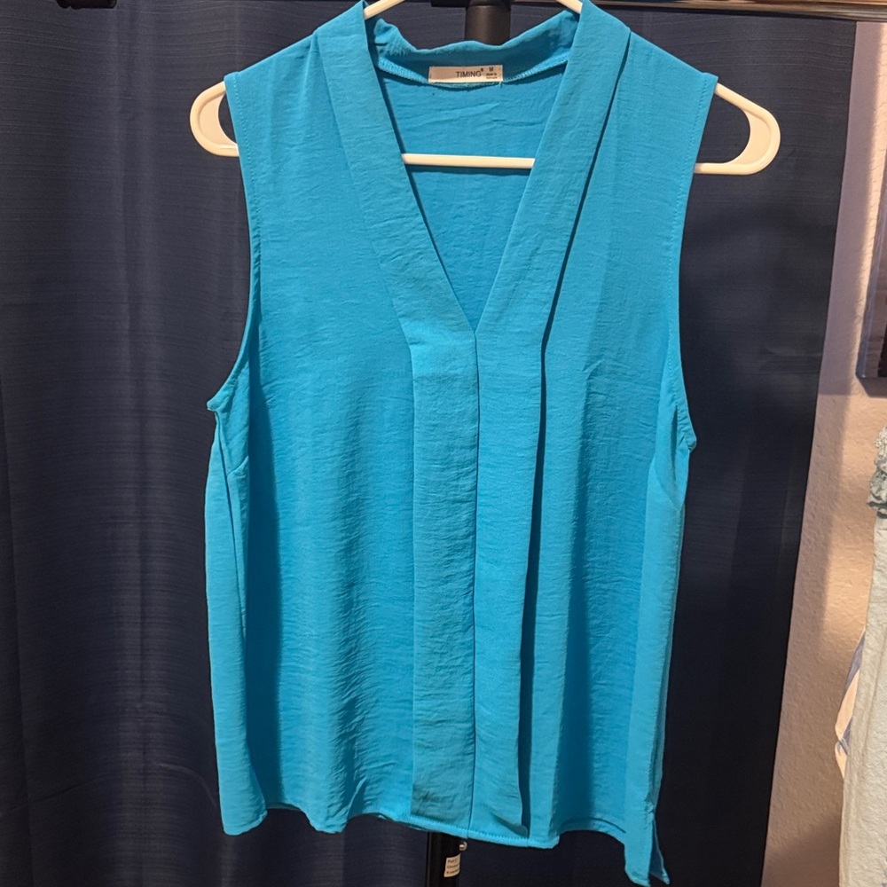 Timing Blue Sleeveless Blouse